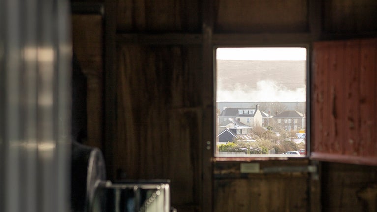 View through window of Taylor's Engine House at East Pool Mine at Pool, near Redruth, Cornwall.